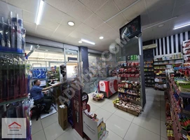 Commercial property rented for sale on a busy main street in KURTKÖY.