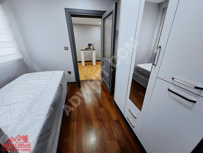 KAVACIK MERKEZDE MEDİPOLE YÜRÜME MESAFESİNDE 1+1 EŞYALI DAİRE