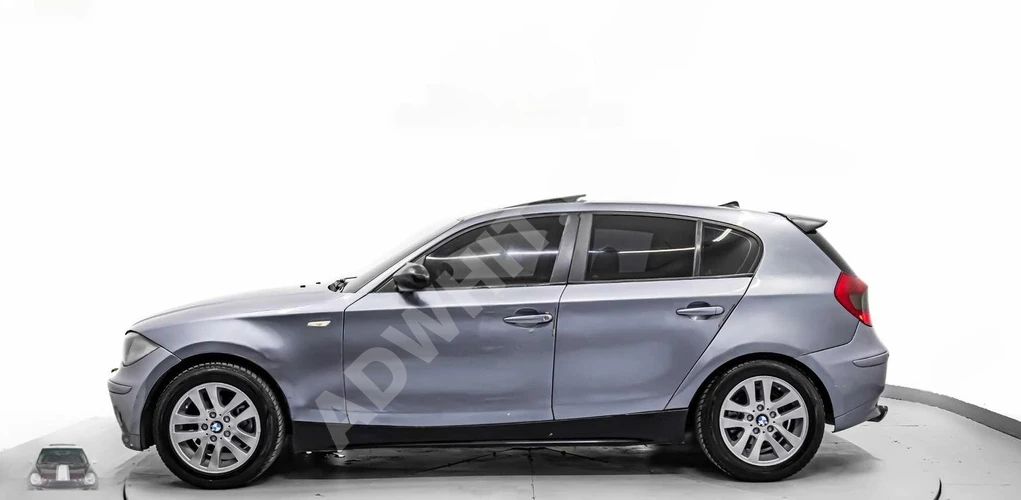 ÖMÜR MOTORS'TAN TAKSİT SÇNKLİ BMW 1.16i BENZİN LPG SANROOF