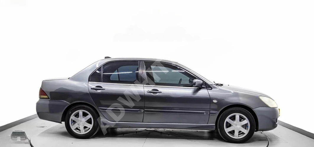 ÖMÜR MOTORS'TAN TAKSİT SÇNKLİ MİTSUBİSHİ LANCER OTOMATİK