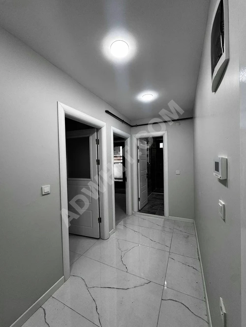 YENİ'DEN MERKEZ.MH DE BÜYÜK TERASLI SATILIK 1+1 DAİRE