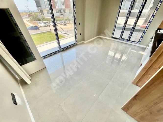 GÜMÜŞDEN GENİŞ BAHÇE KULLANIM SIFIR ULTRA LÜX MUHTEŞEM 2+1 DAİRE