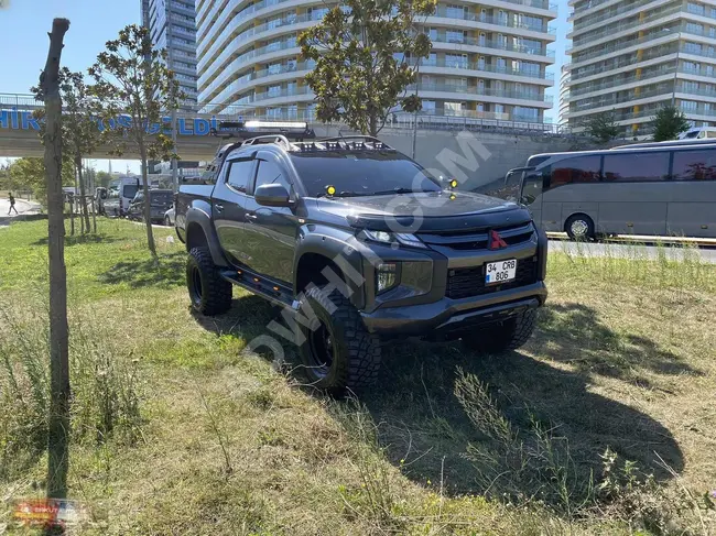 ميتسوبيشي 4X4 بدون عيوب ومجهزة بالكامل للطرق الوعرة من اركوت للسيارات