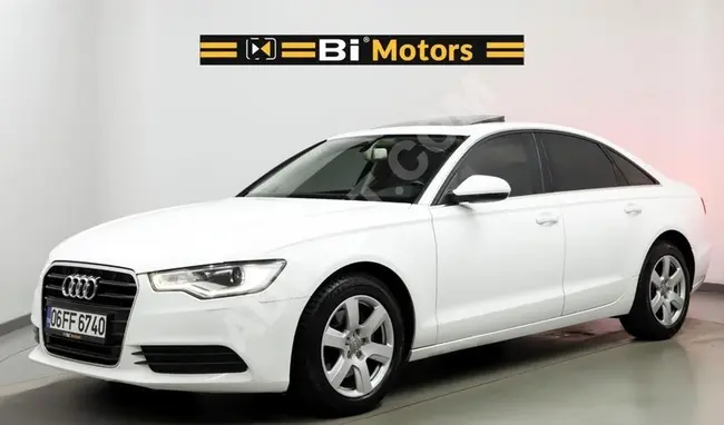 Audi A6 2.0 TDI with sunroof + power closing doors + heating, no defects from BI Motors