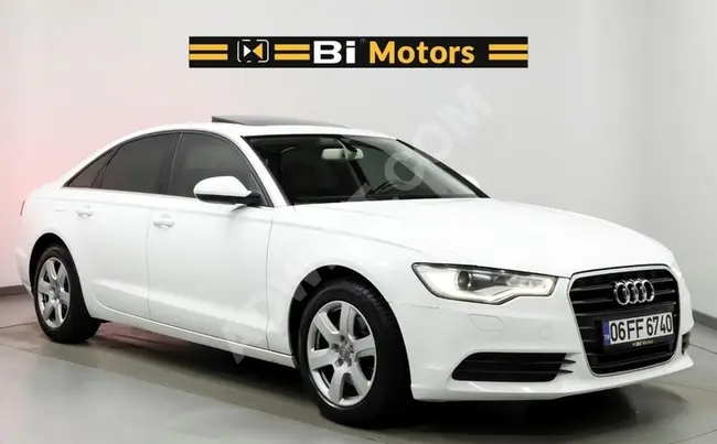 أودي A6 2.0 TDI بفتحة سقف+أبواب شفط+تدفئة بدون عيوب من بي موتورز