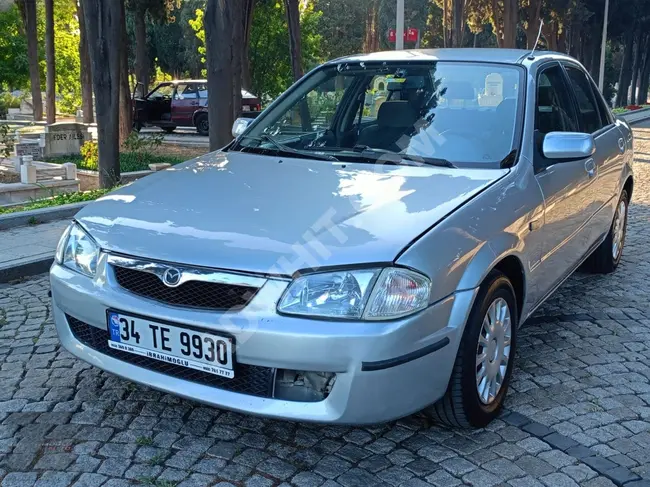 Mazda 1999 family 323 in good condition, 90 horsepower, 1.5 gas