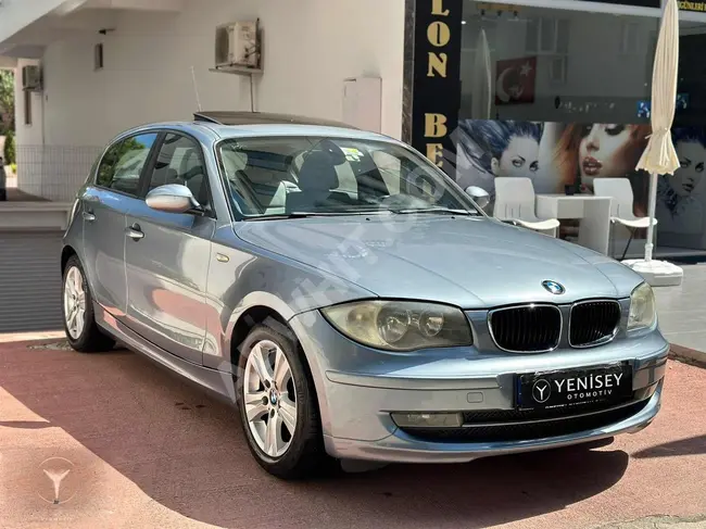 عن طريق سند باليد لمدة 36 شهرًا دفعة مقدمة 30% لسيارة BMW 116i مع سقف بانورامي