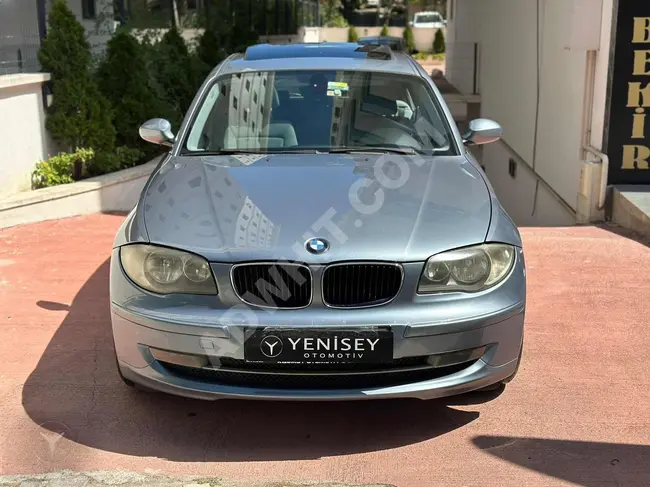 عن طريق سند باليد لمدة 36 شهرًا دفعة مقدمة 30% لسيارة BMW 116i مع سقف بانورامي