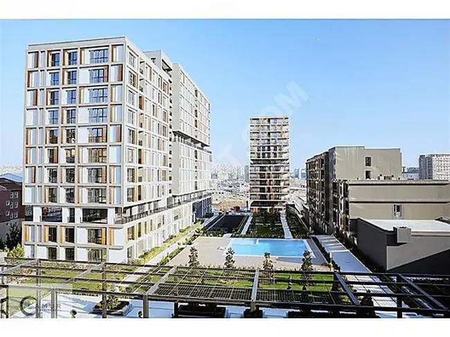 Apartment 3+1 with a balcony overlooking the pool, ready for delivery within the Toya Moda complex