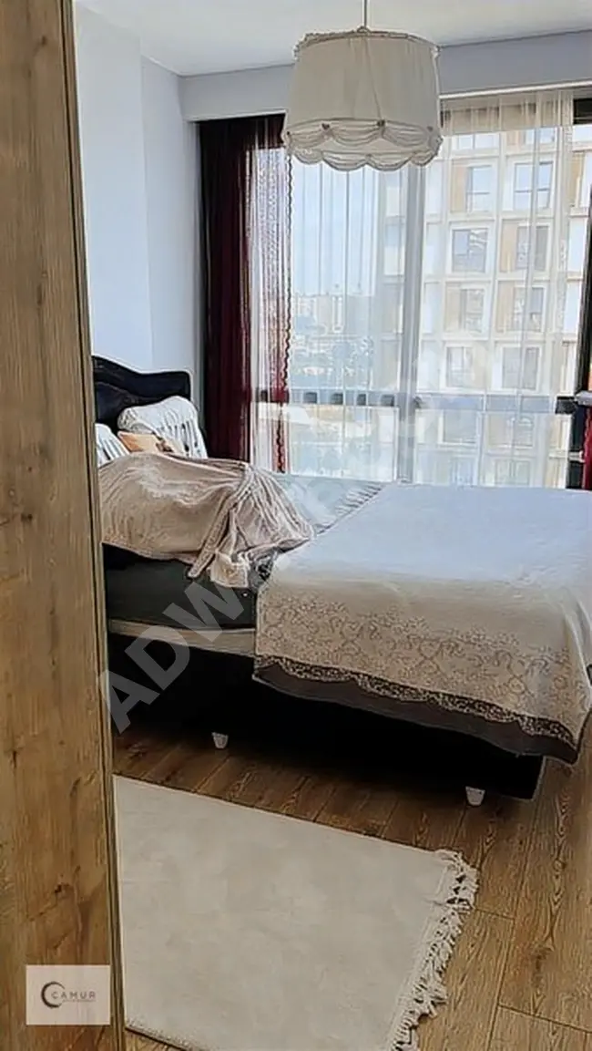 ÇAMUR'DAN TOYA MODA'DA HAVUZ MANZARALI TERASLI 1+1 SATILIK DAİRE