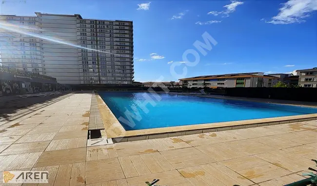 Apartment with rental assurance, 2+1, in a residential complex with a safe pool in ARN Yapi