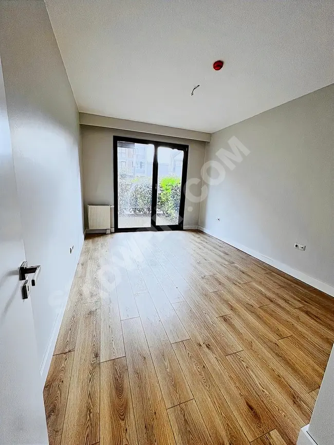 ÇAMUR'DAN TOYA MODA SİTESİNDE BAHÇE KATI 1+1 SATILIK DAİRE