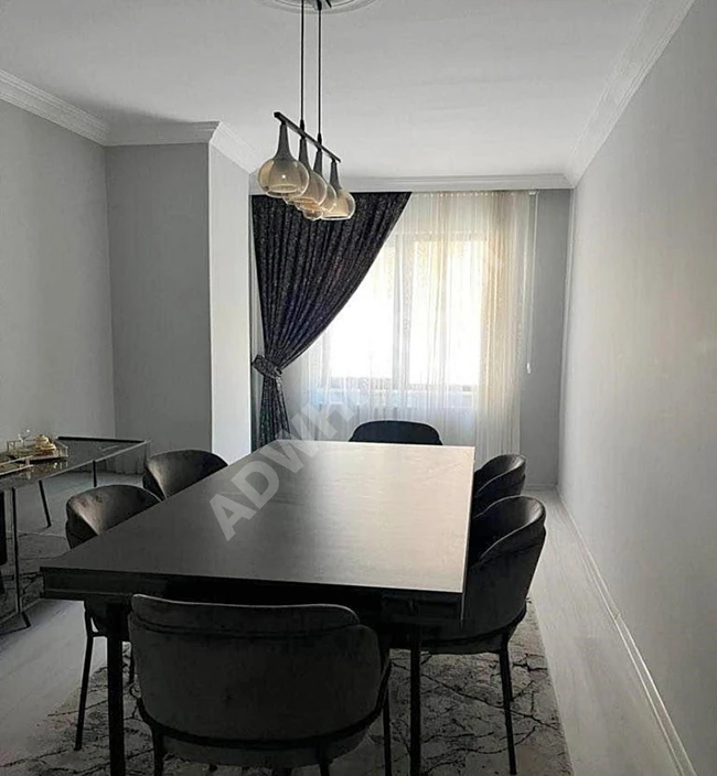 2+1 apartment very close to Bahçeşehir in a luxurious family building