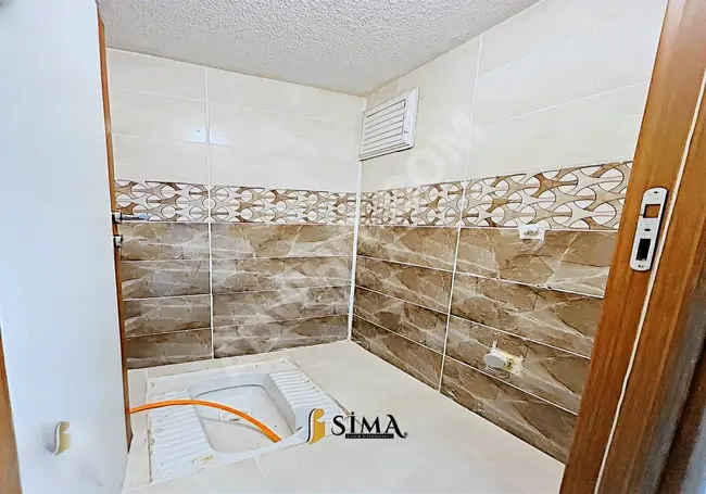 From Sima Construction Company - a 2+1 apartment with decor in a central location and a high floor with a glass view