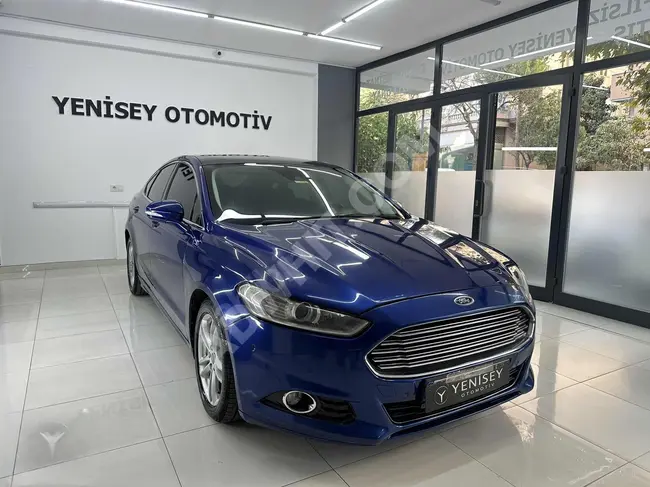 Ford Mondeo 20% down payment, 36 months installments through bonds & loans with a glass roof