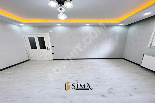 Apartment for sale by SİMA YAPI in a central location with a high glass facade