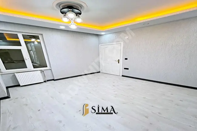 Apartment for sale by SİMA YAPI in a central location with a high glass facade