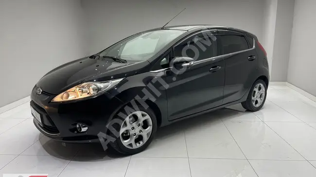 From AG MOTORS, 2011 Ford Fiesta Titanium Automatic..!!!