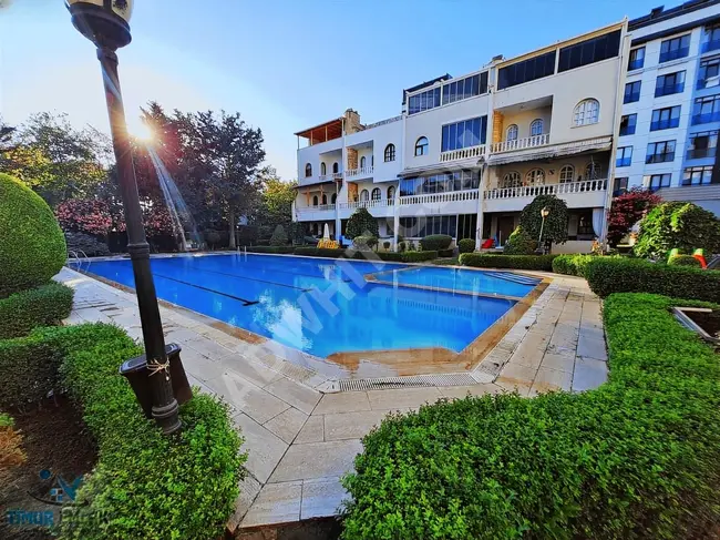 Villa for rent 3+5 with 4 floors, a pool, and a sea view in Gürpınar