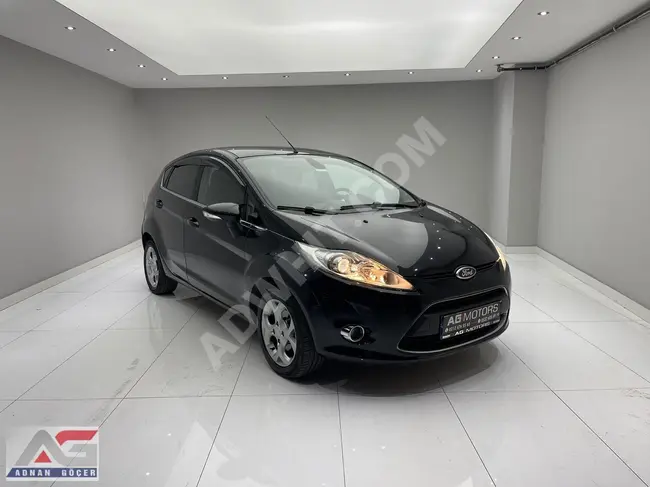 From AG MOTORS, 2011 Ford Fiesta Titanium Automatic..!!!