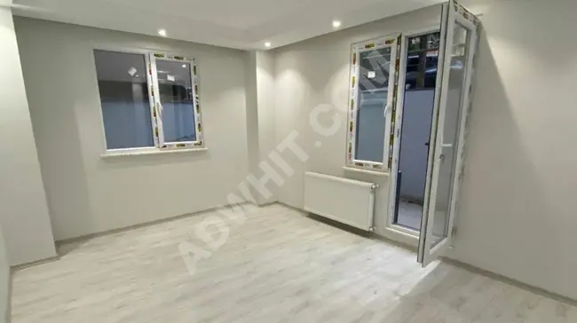 Apartment for sale 2+1 garden floor in Deniz Köşkler