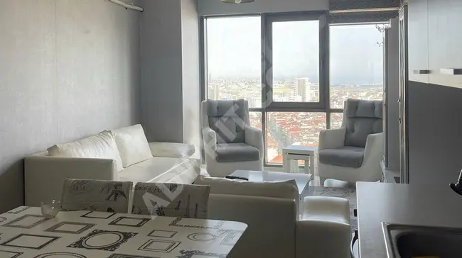 A fully furnished 1+1 apartment with a city view, covering an area of 64 square meters, for sale in İNNOVİA 2 without a tenant