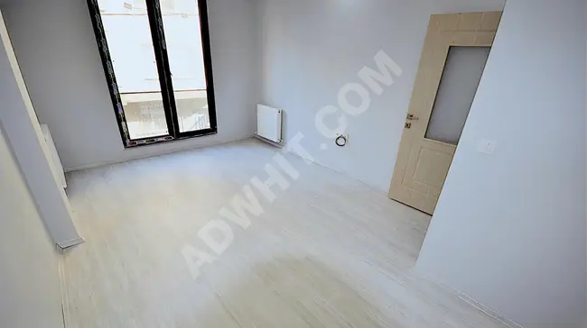 Apartment for sale 2+1 new on the first floor with a balcony in SEFAKÖY FEVZİÇAKMAK neighborhood