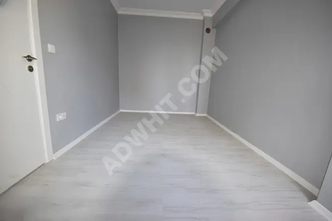 Middle apartment for sale in Yeşilyova neighborhood, consisting of two rooms and a living room, new, equipped with an elevator and a balcony