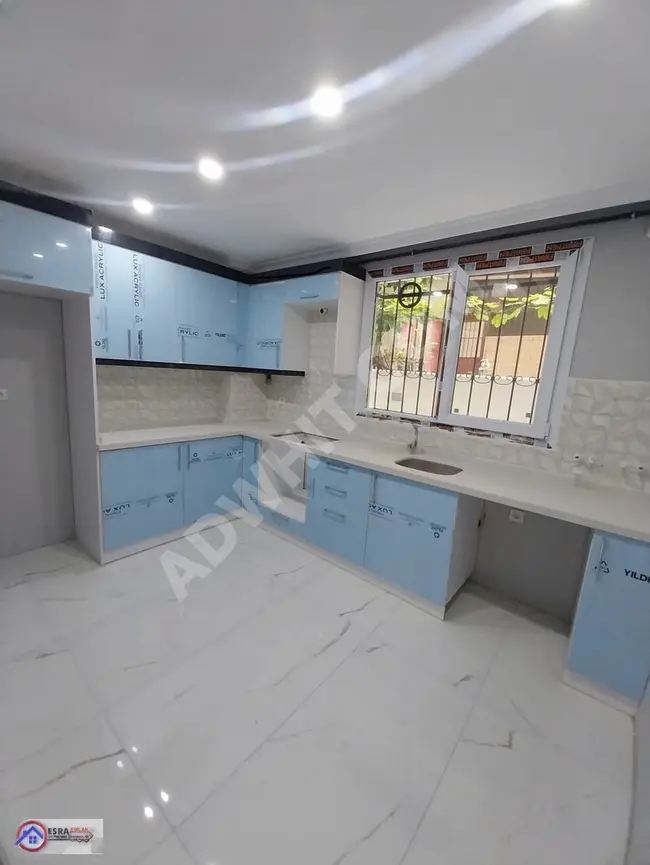 ESRA Real Estate: For sale, a new 1+1 apartment with an area of 70 square meters, spacious, on the ground floor with a garden. In the GÜLTEPE neighborhood,