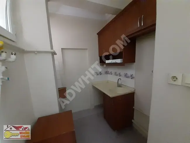 1+1 apartment for urgent sale plus a shop for 1,750,000 Turkish Liras