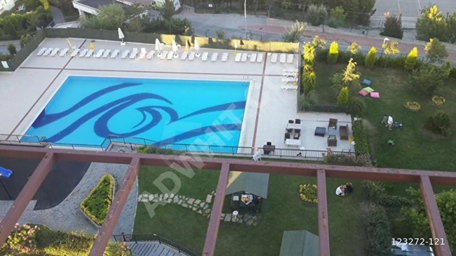 OKAN REAL ESTATE - For sale 3+1 apartment in the second section of Bahçeşehir