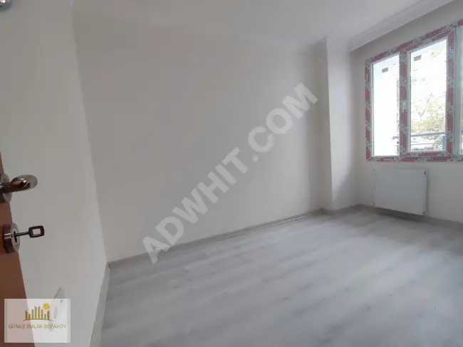 Apartment for sale in the center of SEFAKÖY, a new apartment with three rooms and a living room, 120 square meters with a balcony on the middle floor