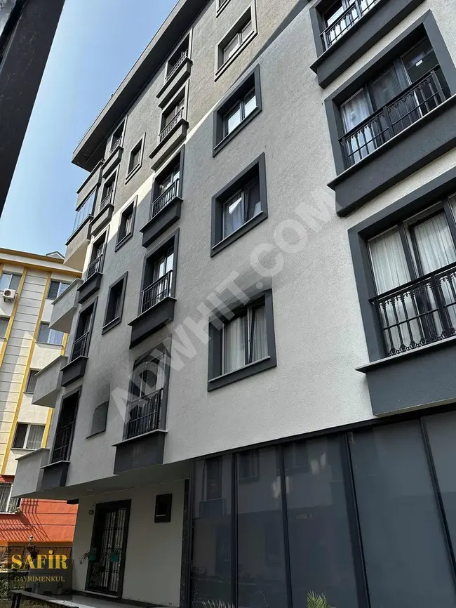 2+1 apartment for sale in a residential complex with a closed parking space in Osmaniye