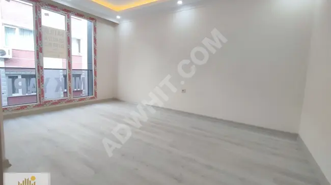 Apartment for sale in the center of SEFAKÖY, a new apartment with three rooms and a living room, 120 square meters with a balcony on the middle floor