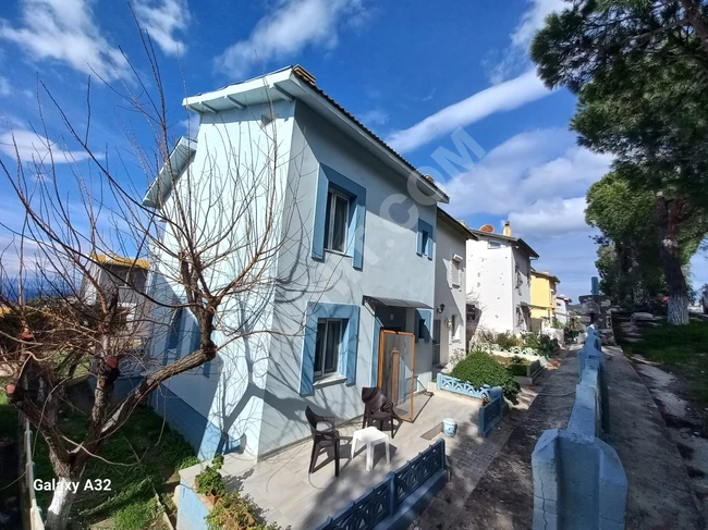 Villa for sale 3+1 in a residential complex with a swimming pool and a full sea view in Doğanbey