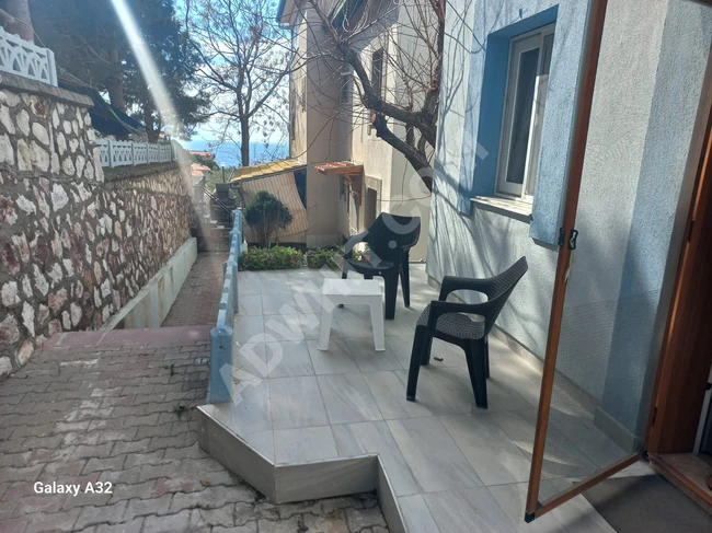 Villa for sale 3+1 in a residential complex with a swimming pool and a full sea view in Doğanbey