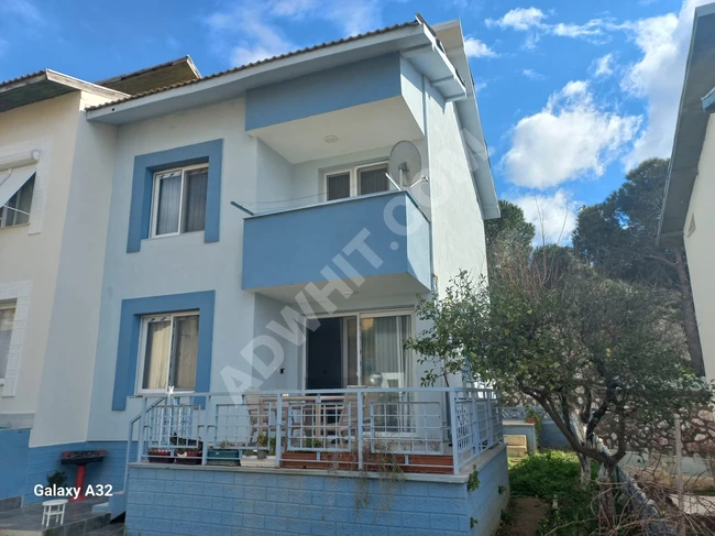 Villa for sale 3+1 in a residential complex with a swimming pool and a full sea view in Doğanbey