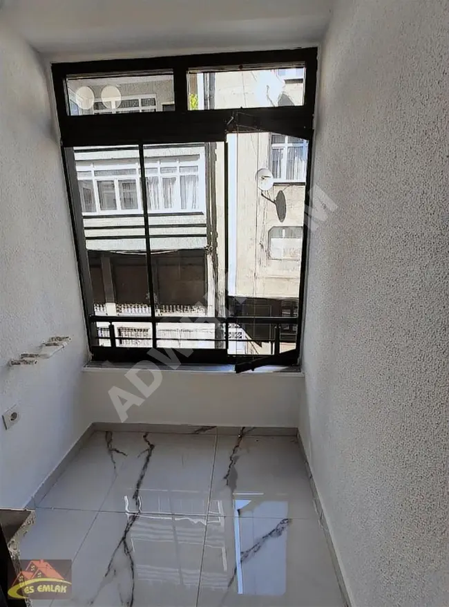 2+1 apartment for sale with an area of 85 square meters on the middle floor in the İKİTELLİ Mehmet Akif area