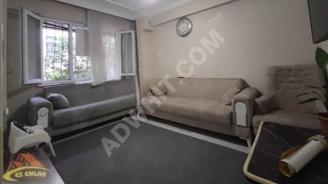 High-rise apartment with a ground floor entrance, 2+1 for sale in İkitelli Mehmet Akif