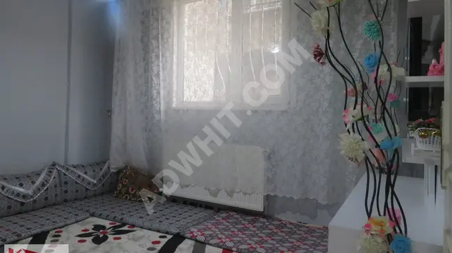 Apartment: 1+1 on the ground floor with large windows, eligible for loan in Mehmet Akif, provided by MİMAR EMLAK