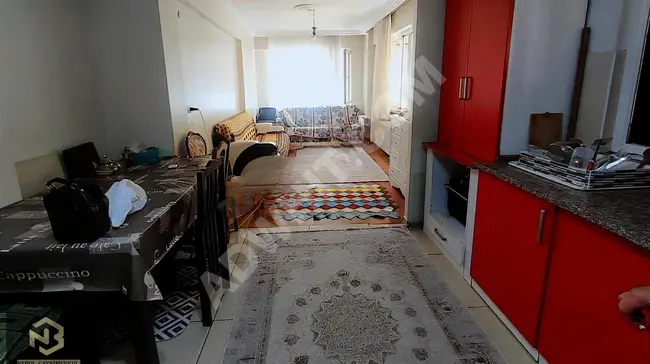 2+1 apartment for sale in Bahçelievler Soğanlı, 9 years old, with a closed parking space