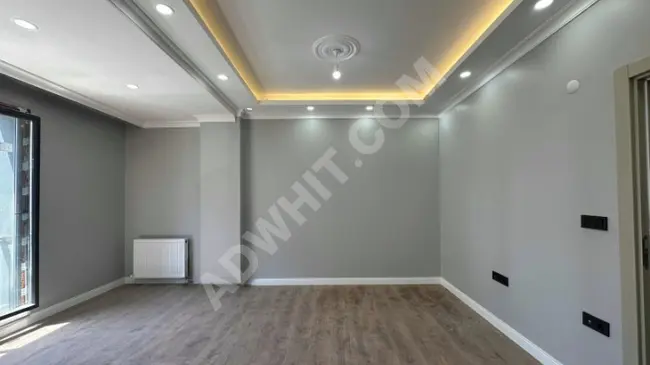 2+1 apartment for sale without title deed costs in the center of Halkalı