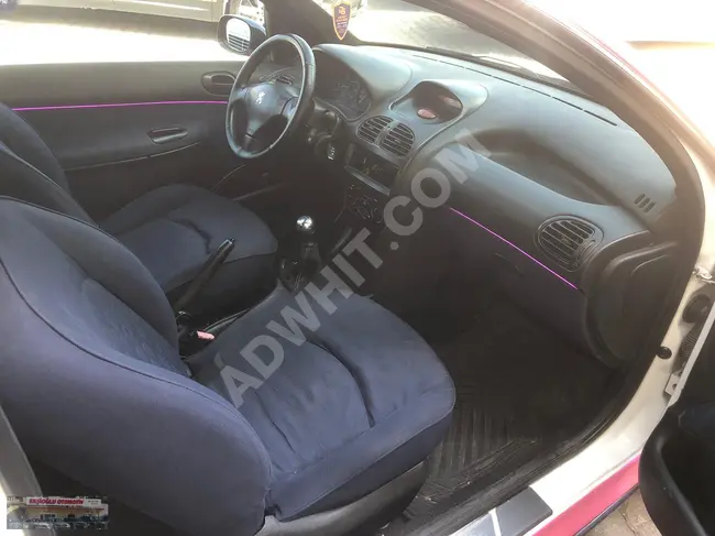 2005 Peugeot 206 van, its interior coverings were changed to pink