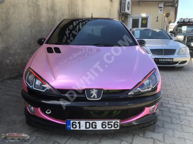 2005 Peugeot 206 van, its interior coverings were changed to pink