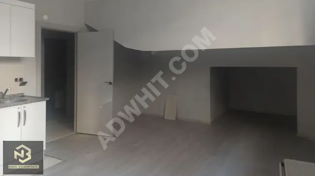 New apartment with a garden for sale in the Soğanlı area in Bahçelievler