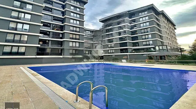 Apartment 2+1 for sale on a middle floor within a fully equipped residential complex in the Beykent area