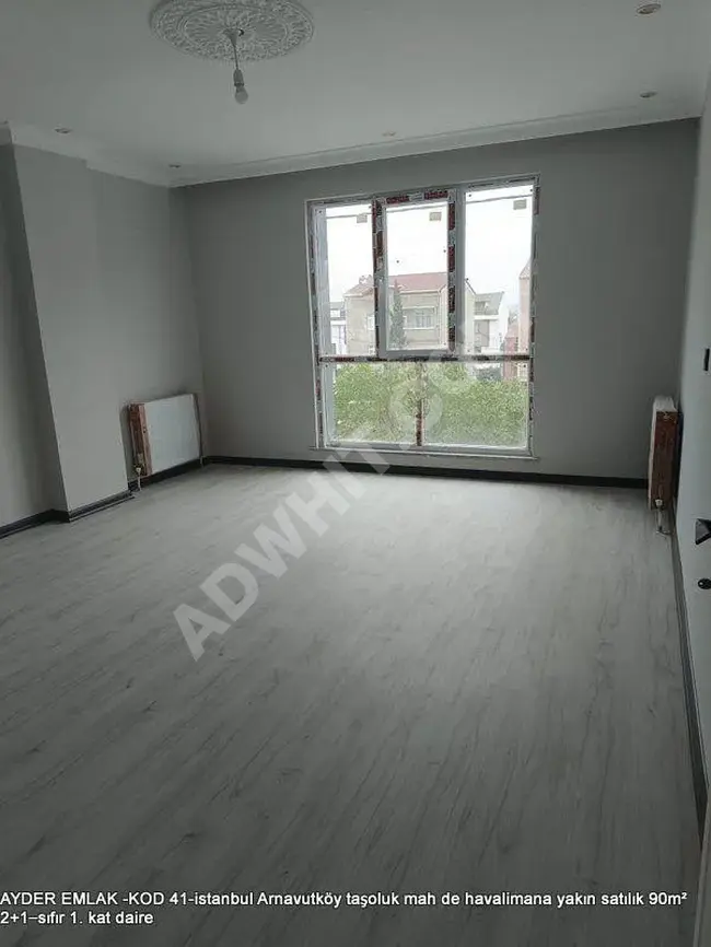 New apartment for sale, close to the airport, 90 square meters, 2+1, first floor in the Arnavutköy taşoluk area