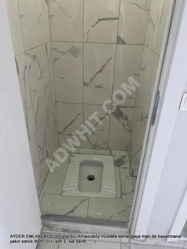 A new 2+1 apartment with an area of 90 square meters on the second floor for sale in Arnavutkoy, Mustafa Kemal Pasa neighborhood, near the airport