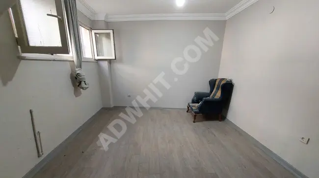 2+1 apartment with an area of 75 square meters at the İkitelli metro station, no additional costs, on the ground floor