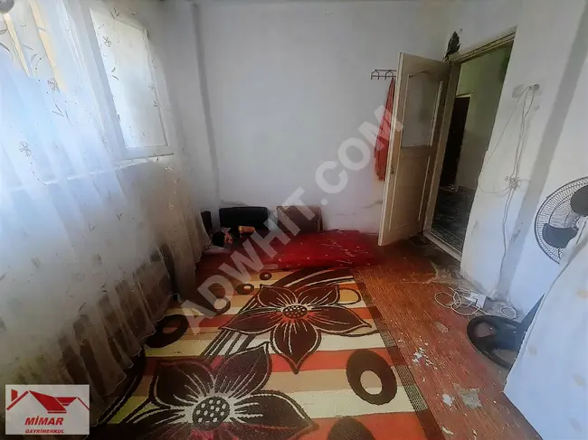 2+1 apartment for sale in M.AKIF, with an area of 70 square meters, including a land share of 15 square meters, basement floor on a single floor